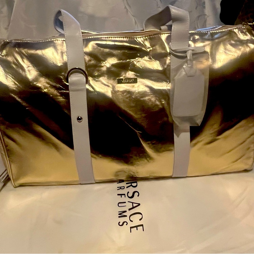 Versace Parfum Gold Duffle Bag- NWT. Discontinued!!